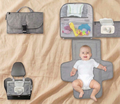 3-in-1 nappy changing clutch shown closed, open with storage, attached to car seat, and unfolded as changing mat with baby