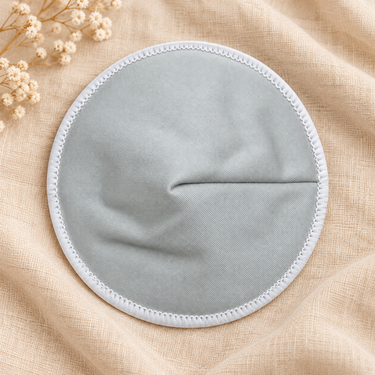 Reusable breast pad - sage grey fabric close-up