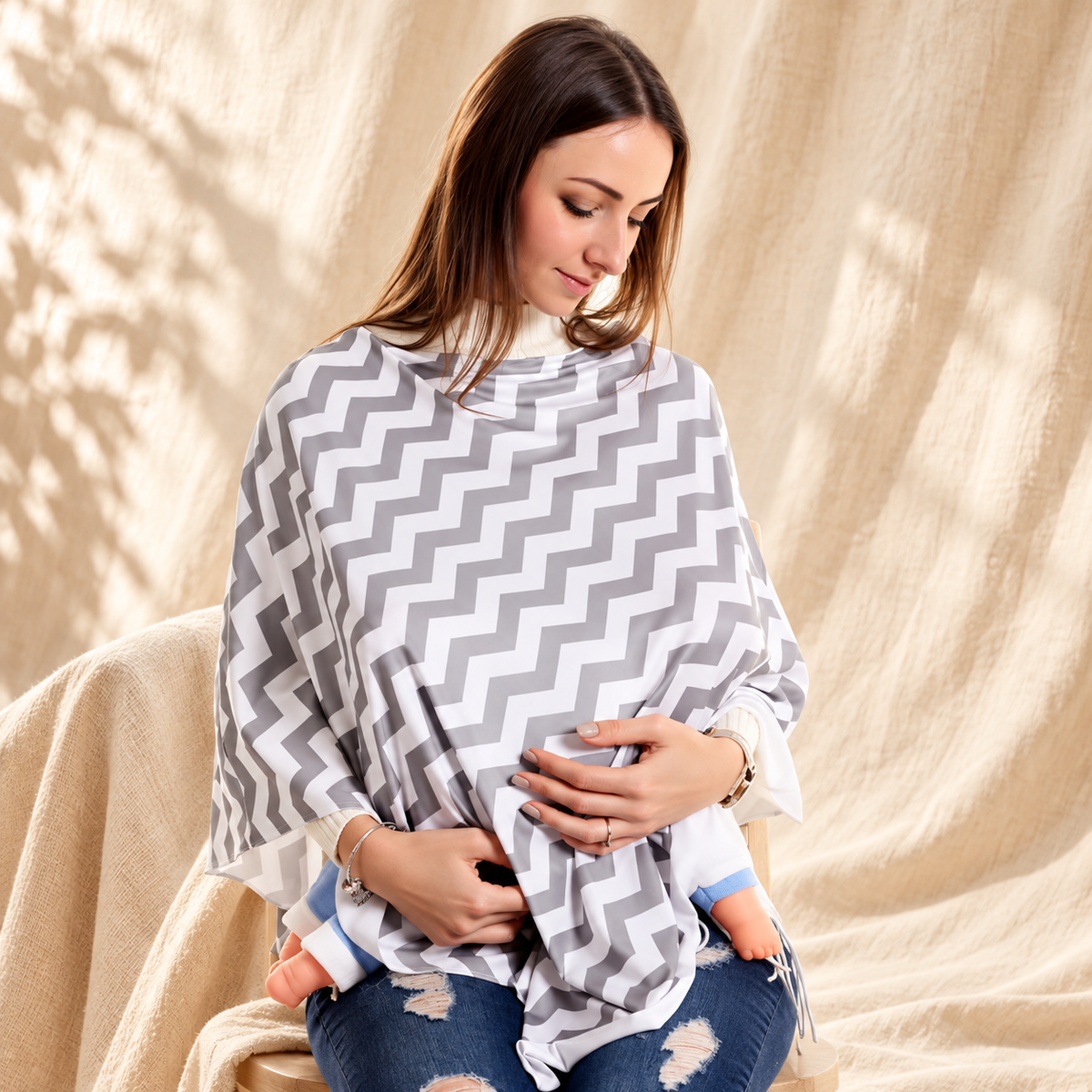 Mom wearing grey chevron poncho nursing cover breastfeeding baby